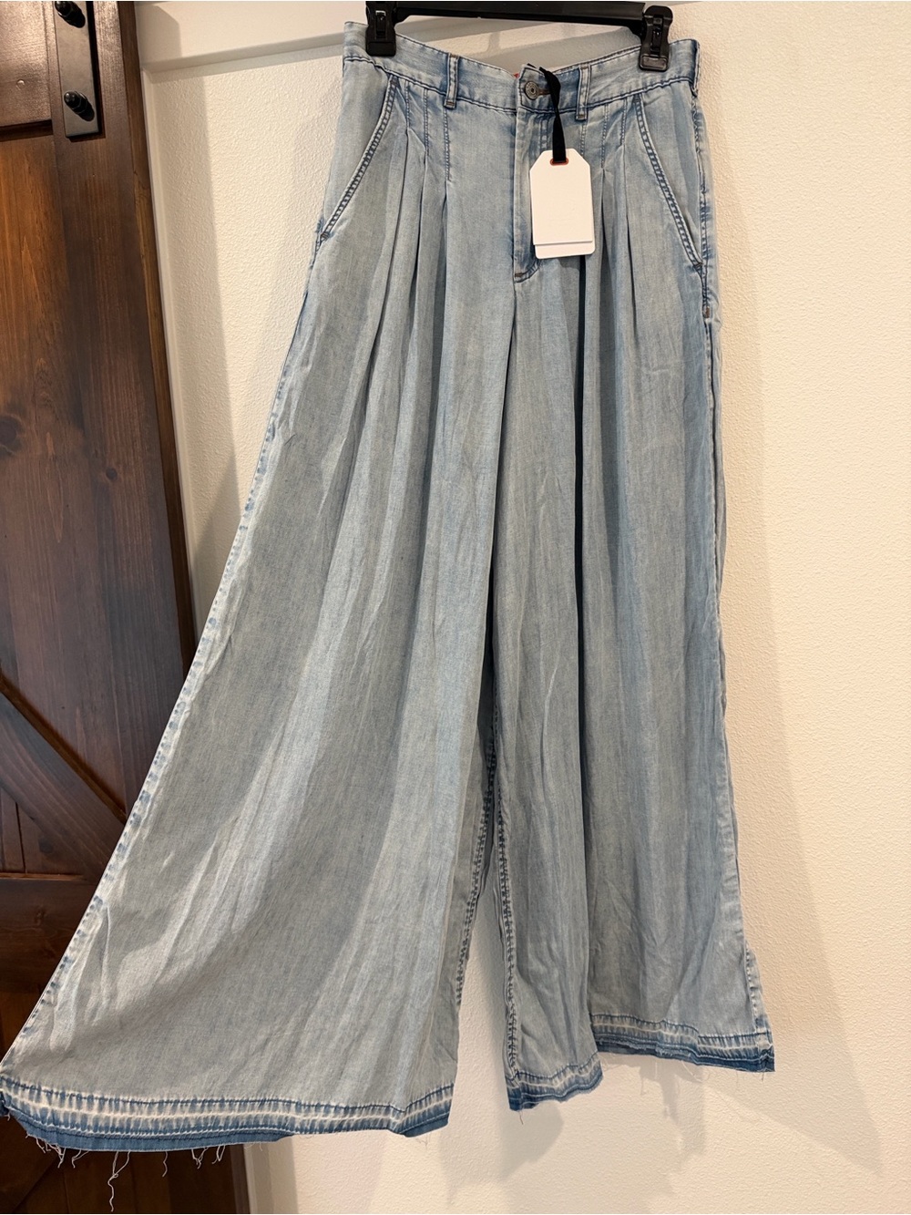 High-Rise Light Blue Wide-Leg Jeans with Pleated Front